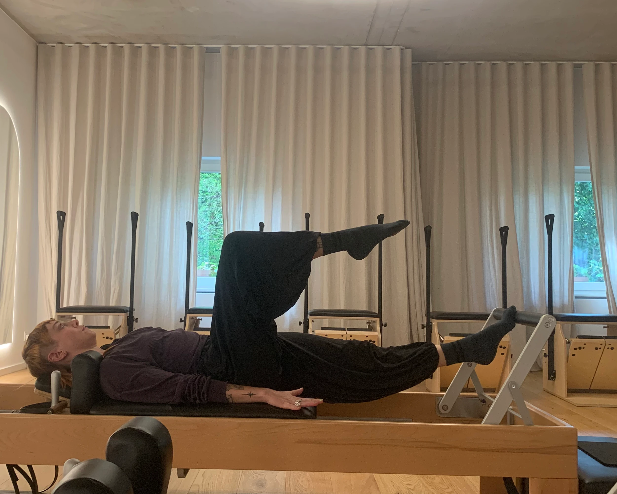 Pilates practice on a reformer
